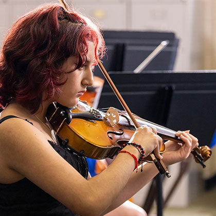 Student playing violin